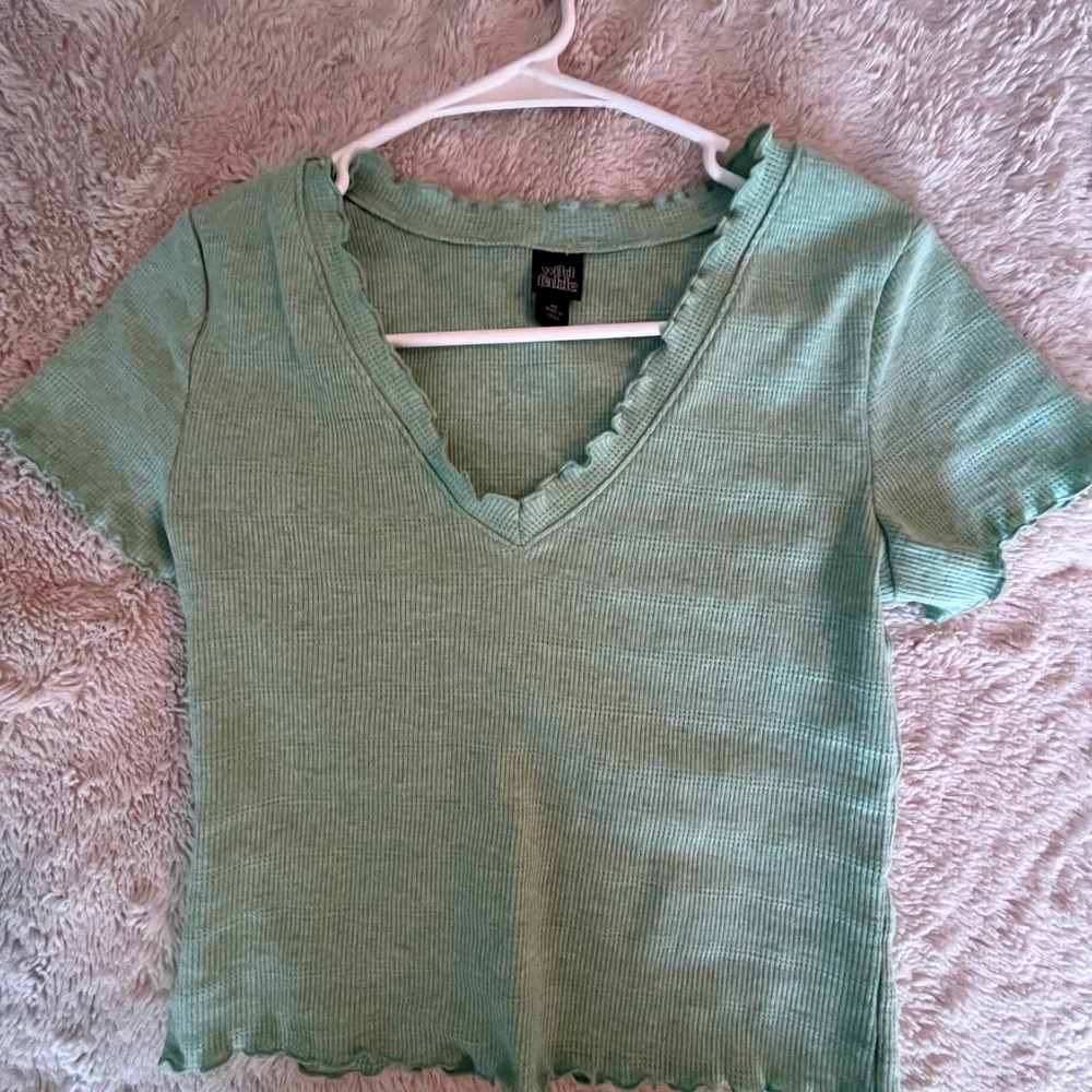 Mint green shirt. Only worn once.
